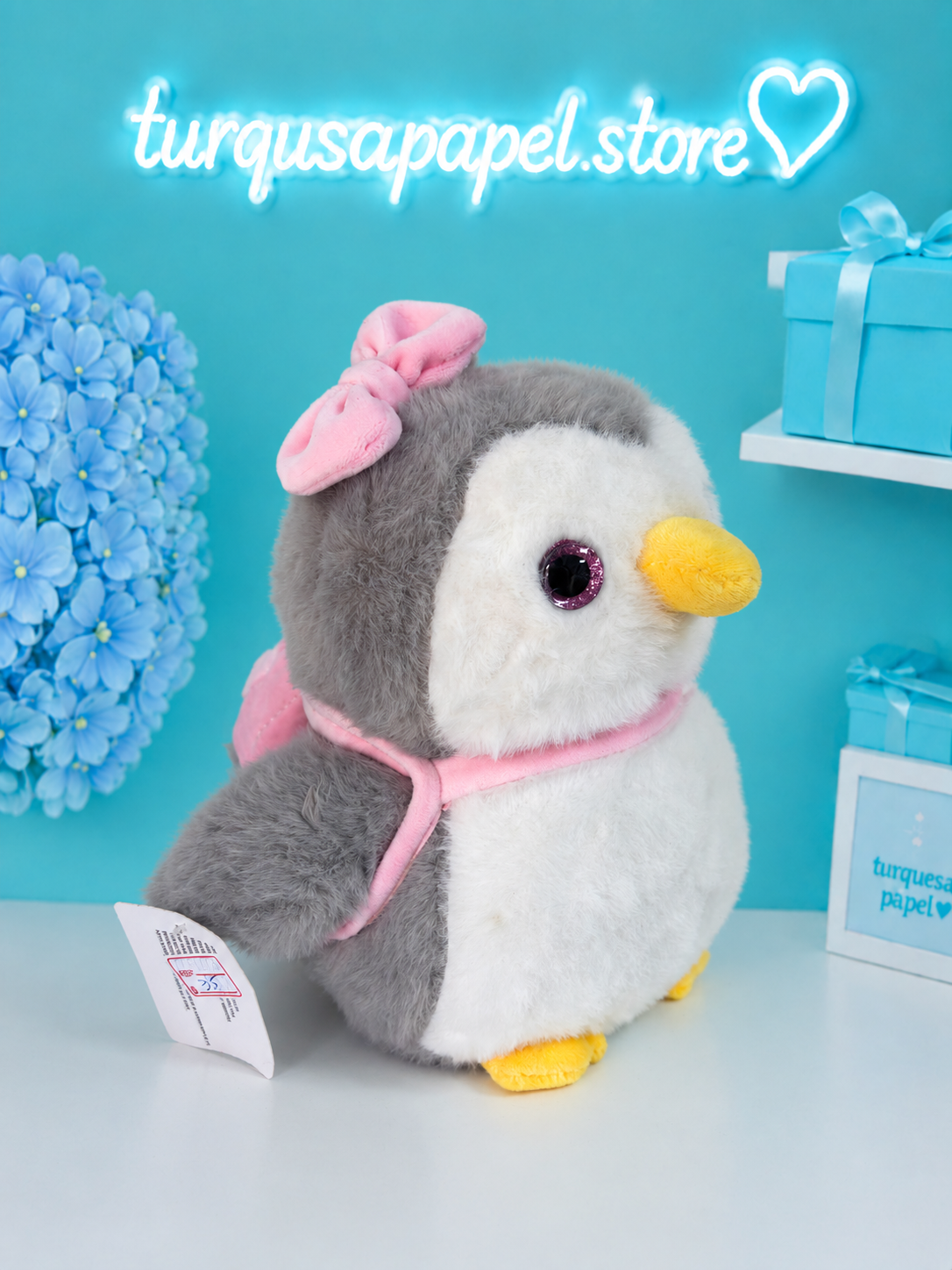 Pinguino maleta rosada